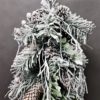 ośnieżona szadziowa choinka na pniu nowoczesna dekoracja wnętrz oryginalna ozoba świąteczna
